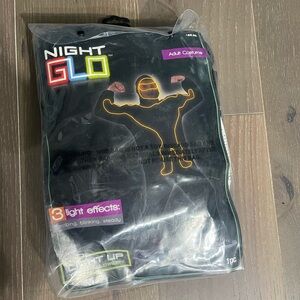 Kmart Night Glo adult light up costume. NWT lights up orange